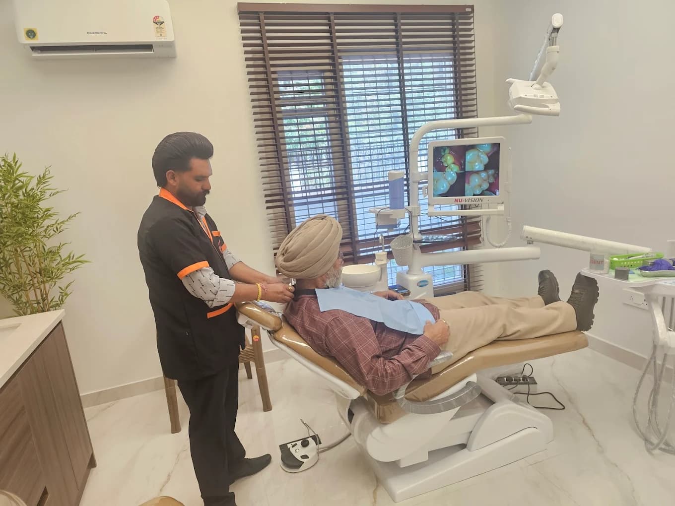 Caring for an elderly patient at Smile Architects, Amritsar